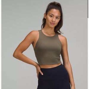 Lululemon invigorate training top size 4 new with tags. Carob brown color